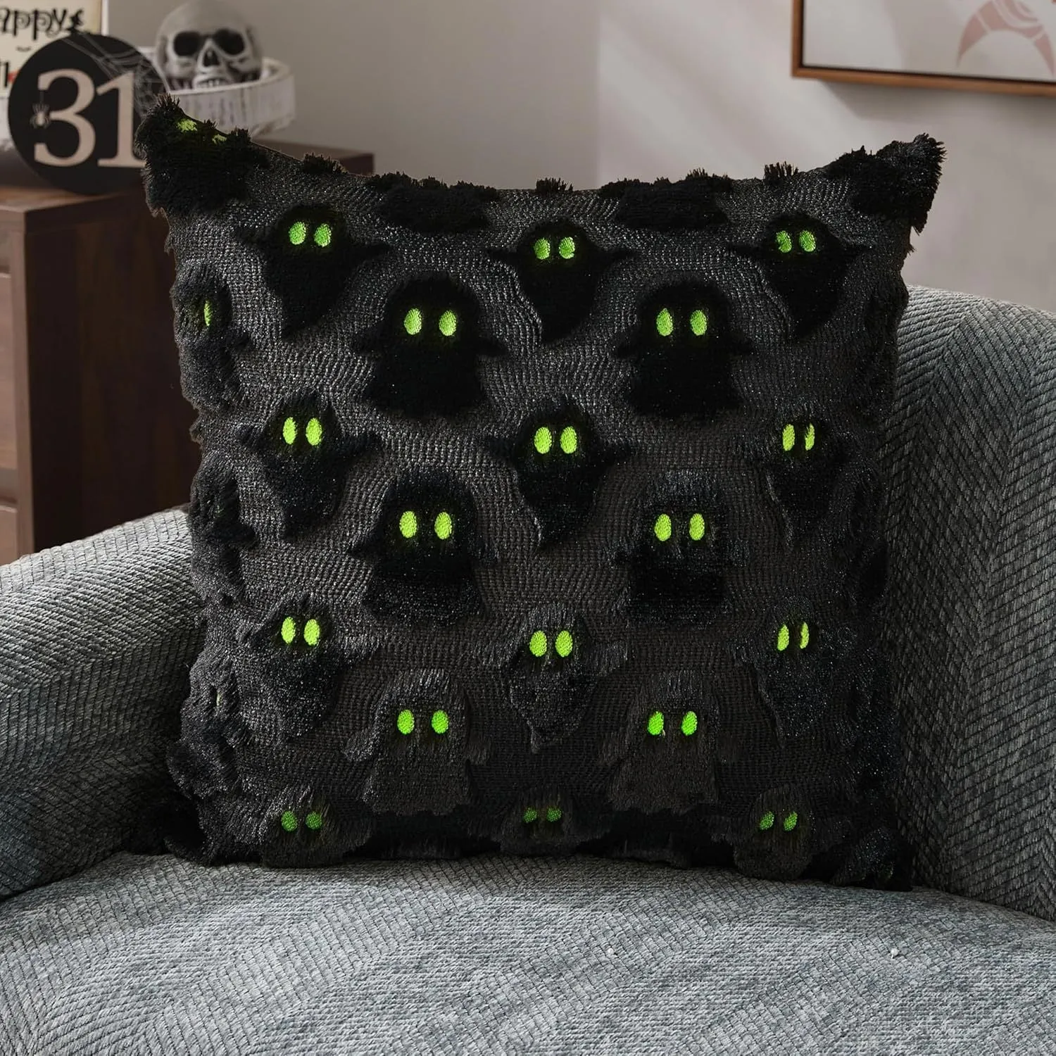 Plush stereo ghost embroidered black and white holiday decorative cushion cover 45x45cm on sofa