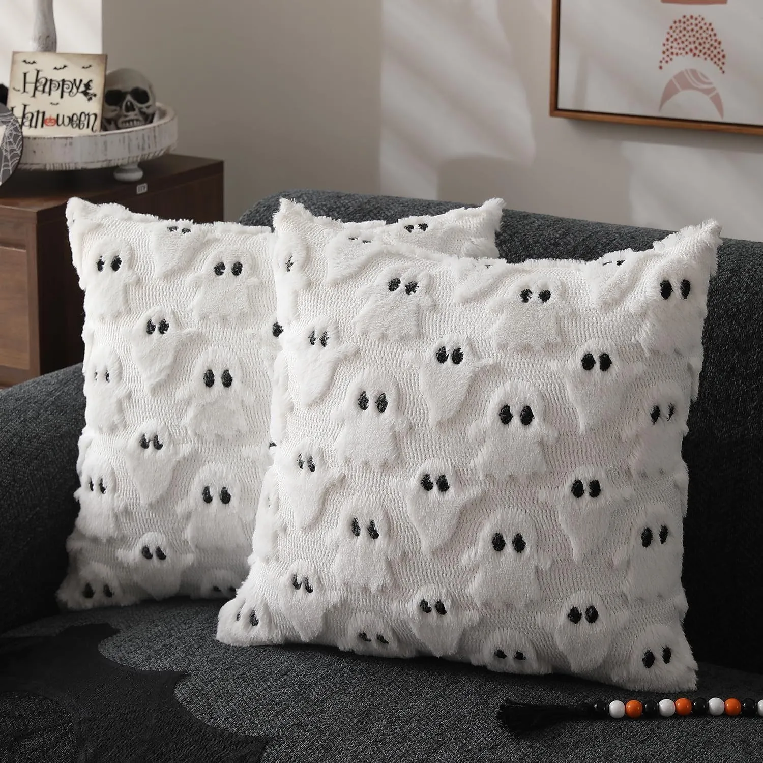 Plush stereo ghost embroidered black and white holiday decorative cushion cover 45x45cm on sofa