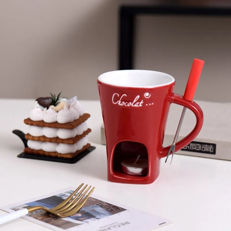 Ceramic binaural hot pot cup in brown for melting chocolate with fork and candle beside it