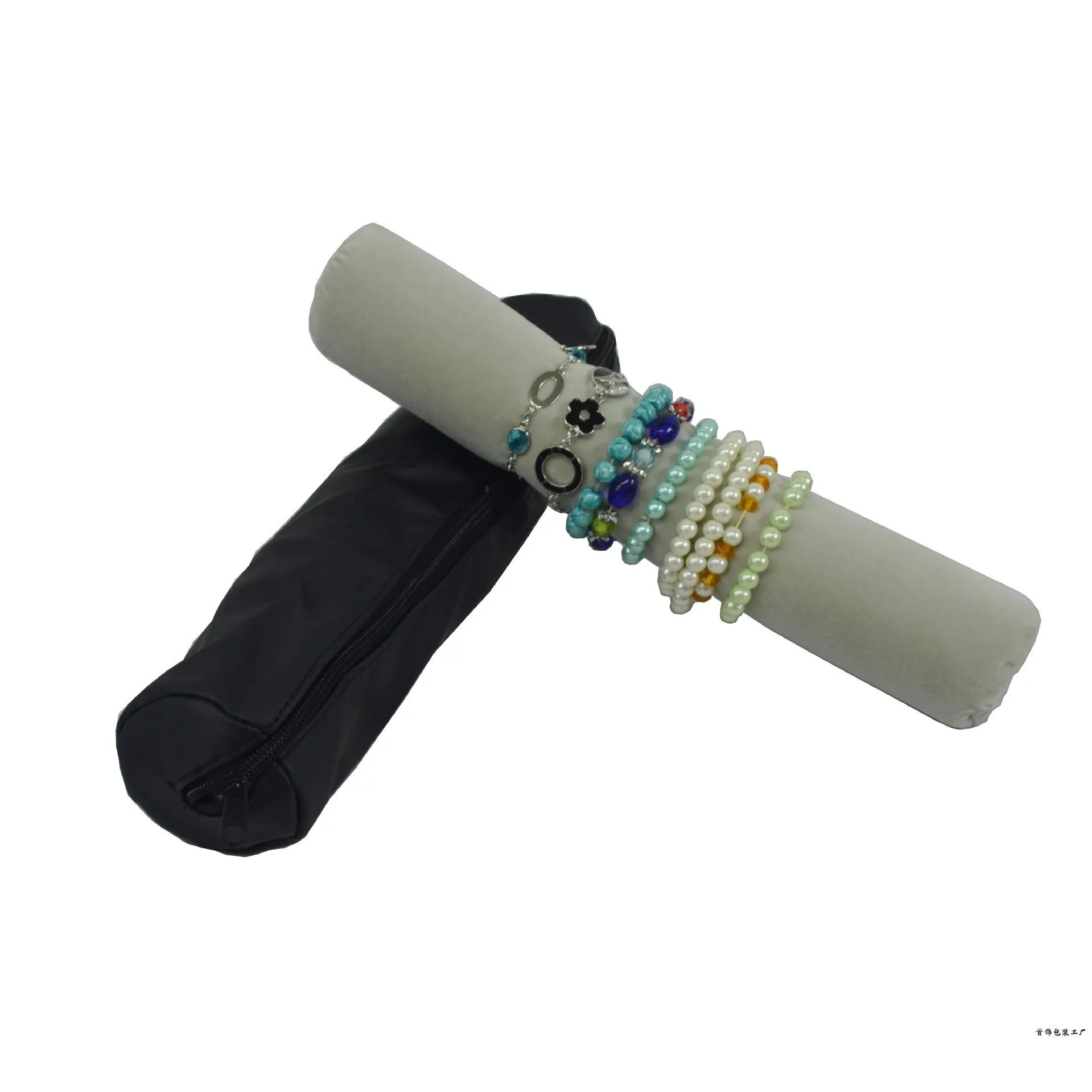Portable bracelet watch storage bag in black leather with black bracelet stick on a flat surface