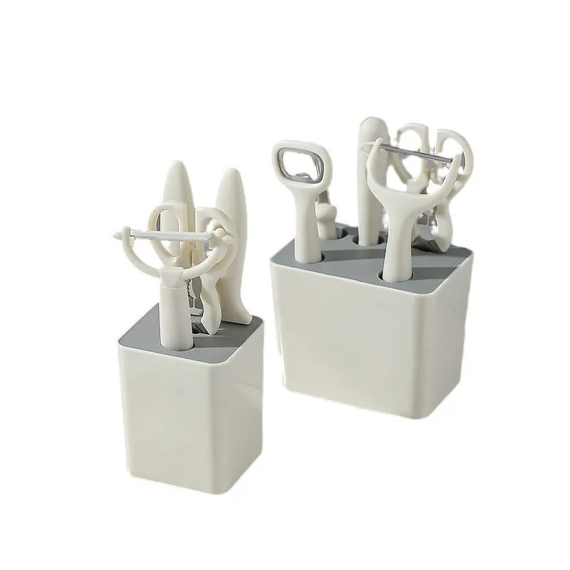Six-piece white stainless steel kitchen gadget set with modern simplicity design on a clean surface