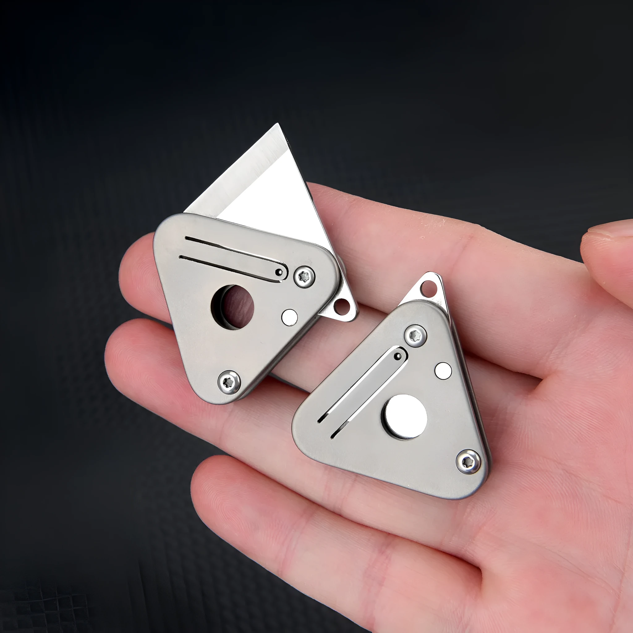 Triangle titanium alloy mini portable knife with stainless steel blade and button lock in silver gray