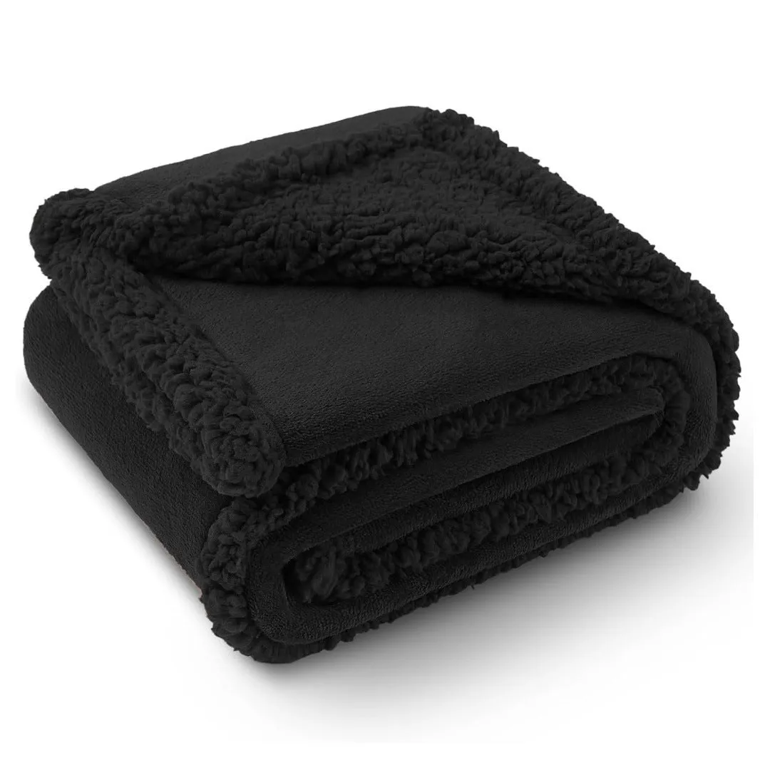 Pet waterproof blanket in beige flannel on a sofa with a dog lying on it