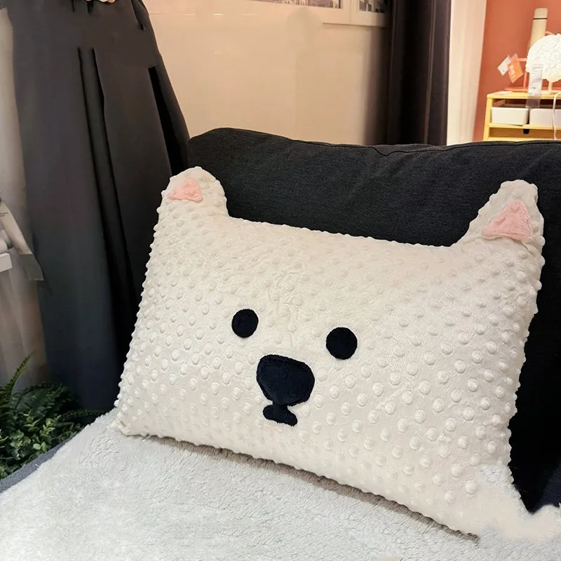 Grey and white West Highland puppy pillow dog cushion on a sofa.
