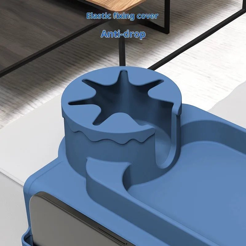 Modern irregular silicone coaster in solid colour on a wooden table surface