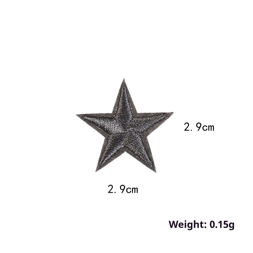 Colourful five-pointed star cloth embroidery stickers for DIY clothing decoration on a fabric background.