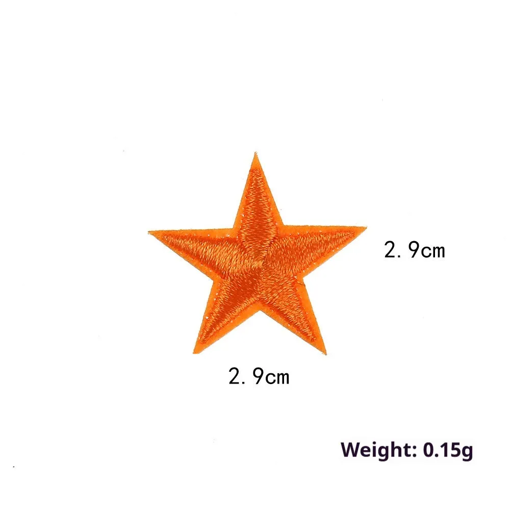 Colourful five-pointed star cloth embroidery stickers for DIY clothing decoration on a fabric background.