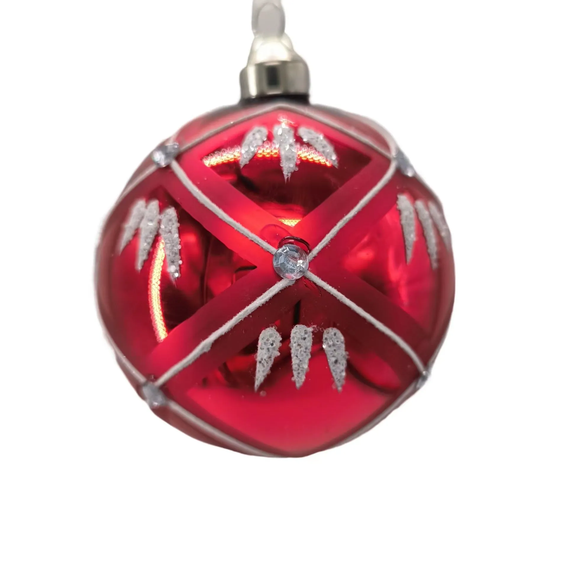 Colourful glass ball hanging ornament on a string against a white background