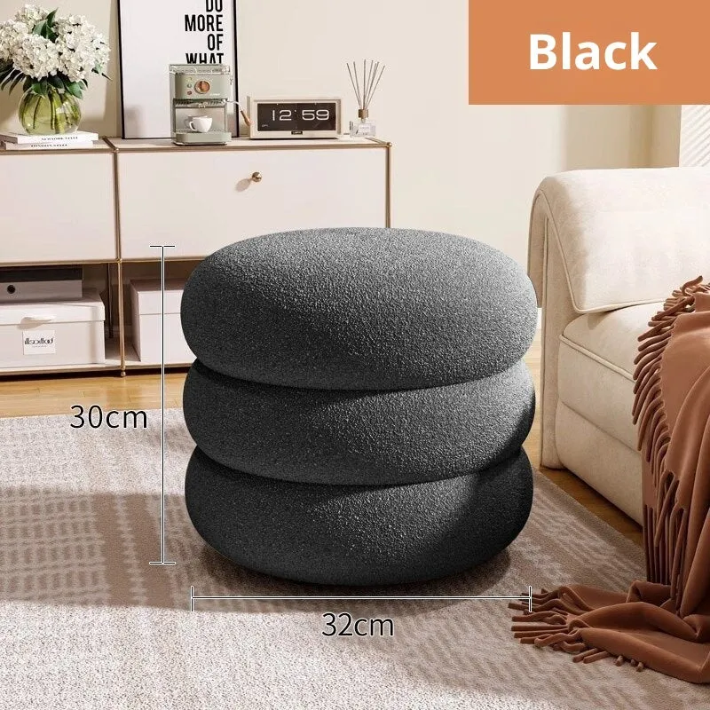Small cream style round stool with skin-friendly lamb high elastic sponge fill in a living room