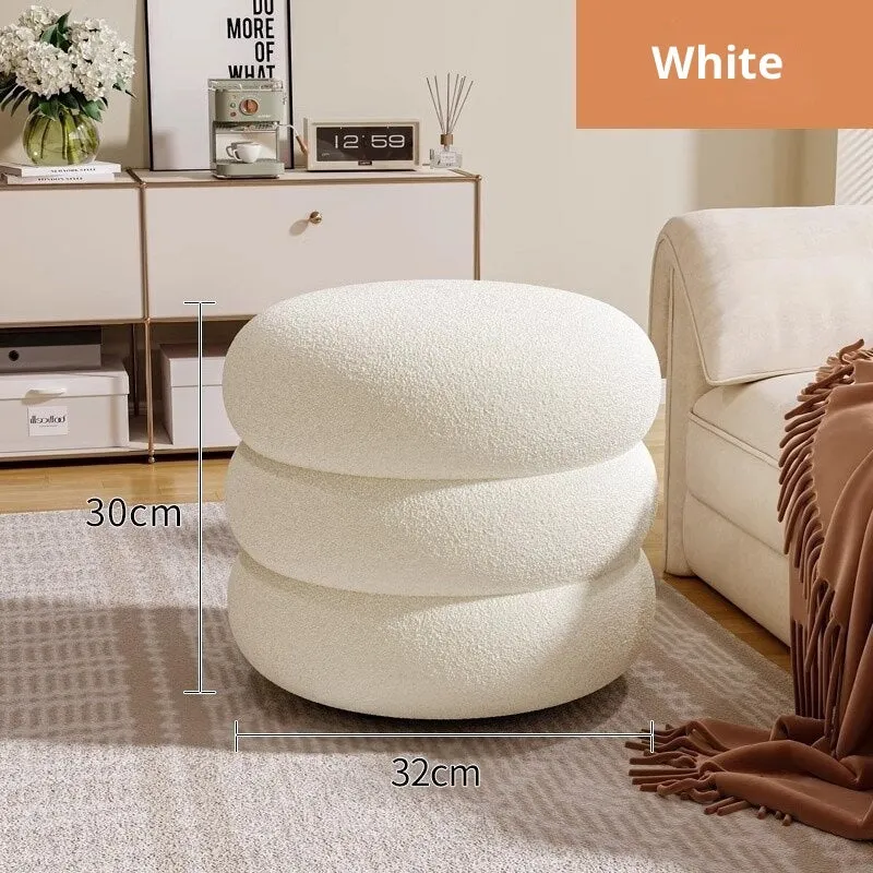 Small cream style round stool with skin-friendly lamb high elastic sponge fill in a living room