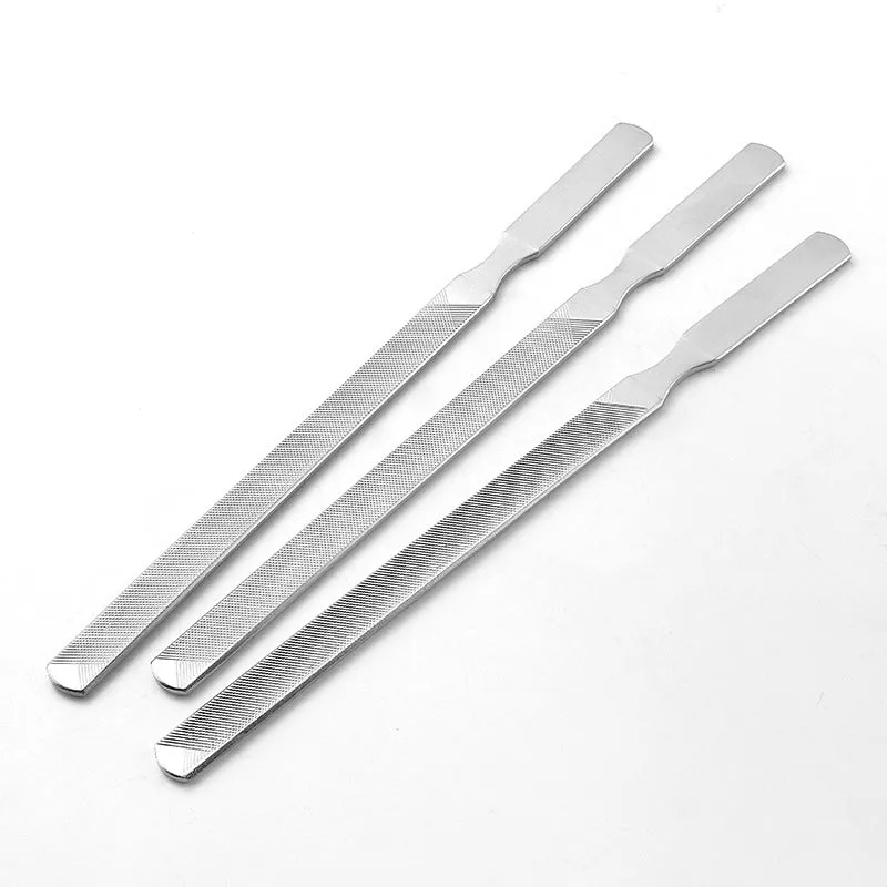 Gray stainless steel nail sanding bar with coarse sand surface for manicure and pedicure