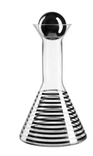 Modern black striped glass cold water bottle 1000ml with two cups on a light surface