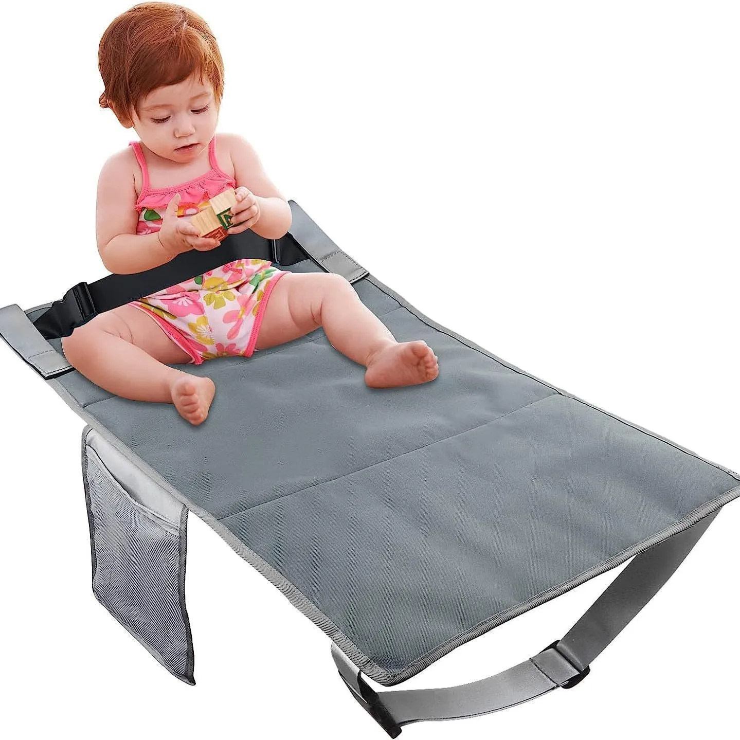 Portable blue children's aircraft seat extender with removable drawstring storage pocket folded for travel