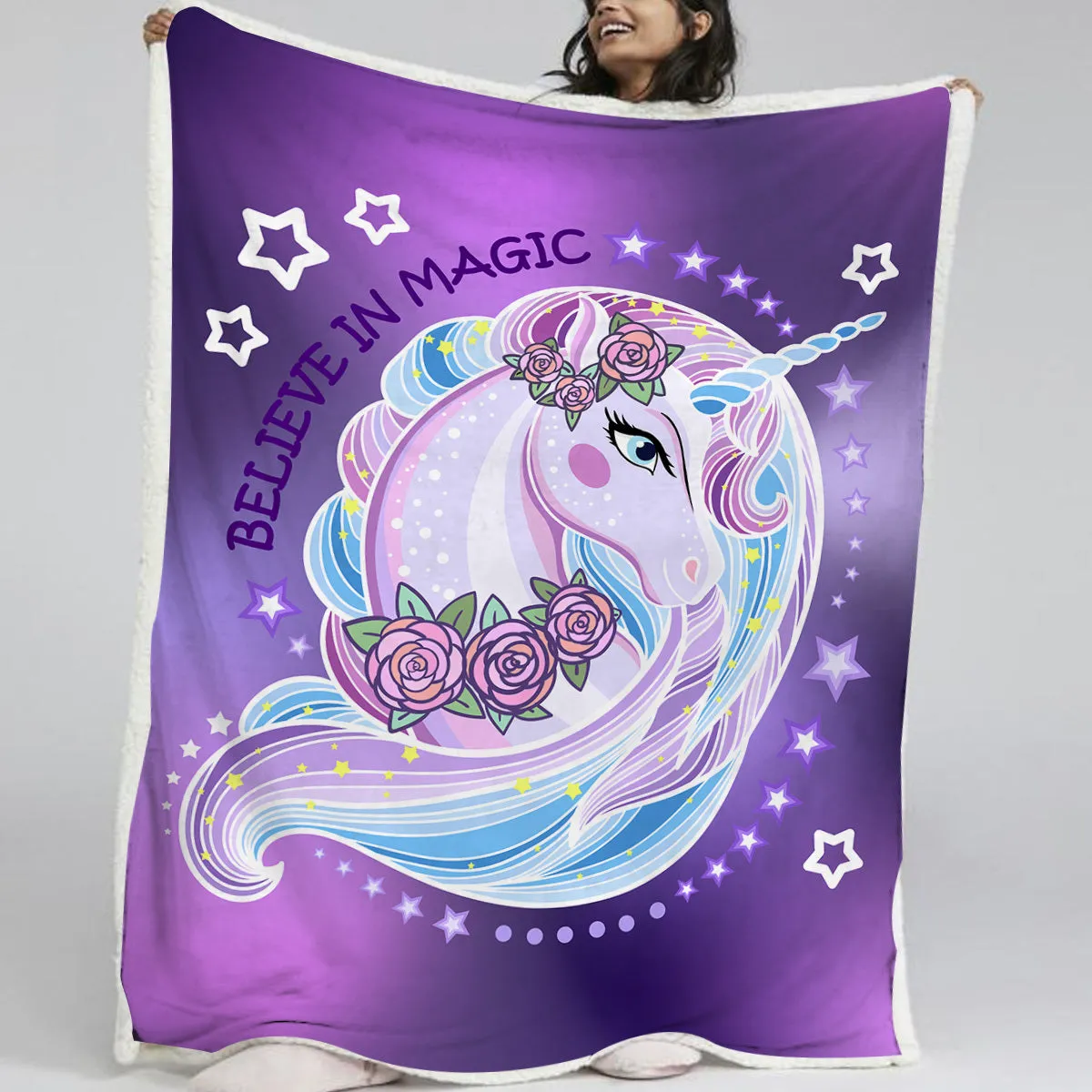 Purple unicorn themed lamb wool Sherpa fleece throw blanket 130x150cm with hemmed edges on sofa
