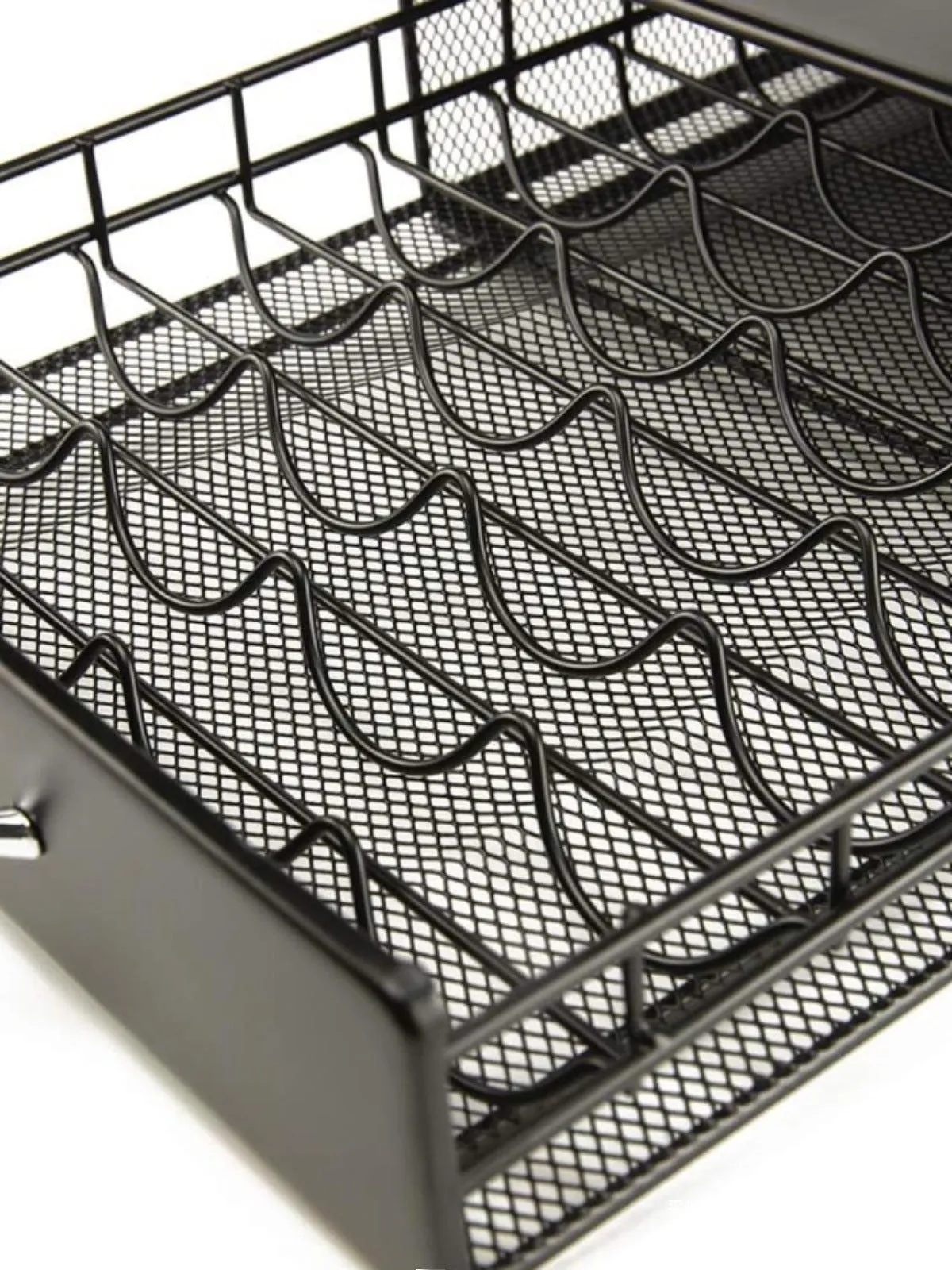 Black coffee capsule storage drawer with silver handle, 40x29x8.5cm, on a cafe countertop