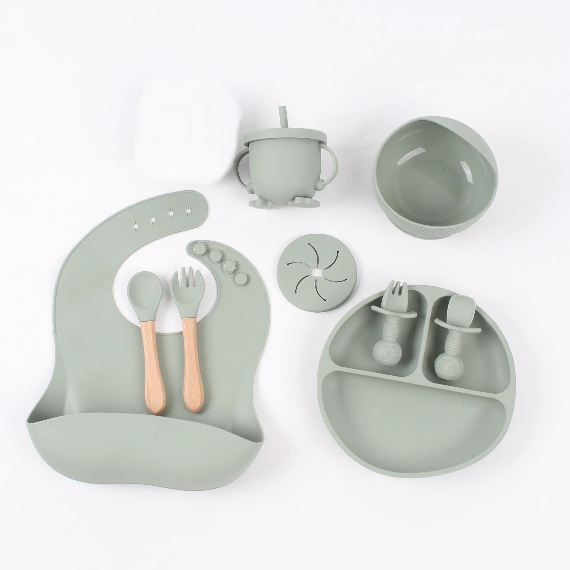 Silicone baby food snack catcher bib tableware set in nine colours including dark pink, light blue, army green, beige, and purple