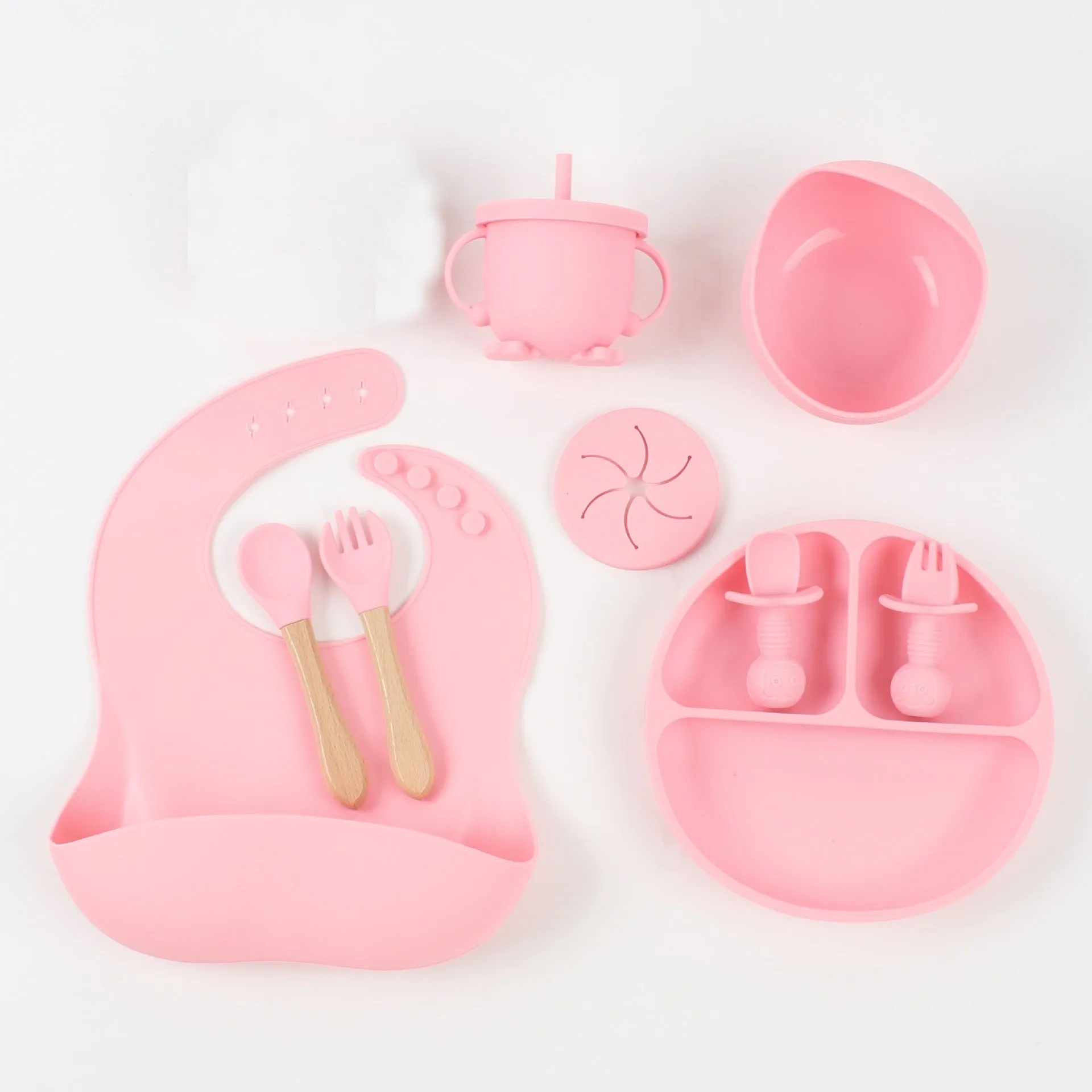 Silicone baby food snack catcher bib tableware set in nine colours including dark pink, light blue, army green, beige, and purple
