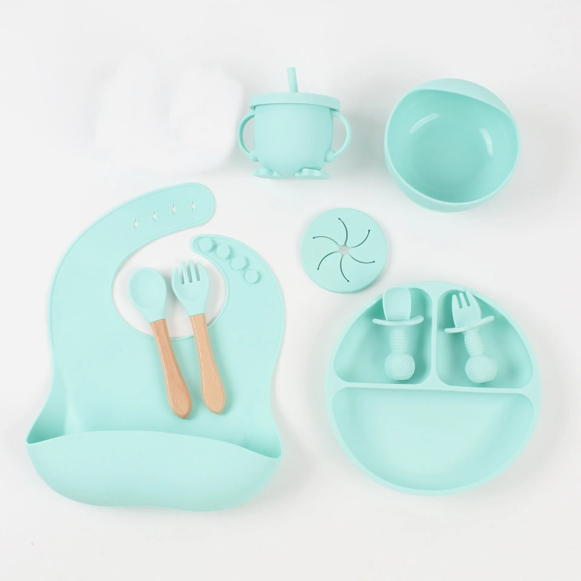 Silicone baby food snack catcher bib tableware set in nine colours including dark pink, light blue, army green, beige, and purple