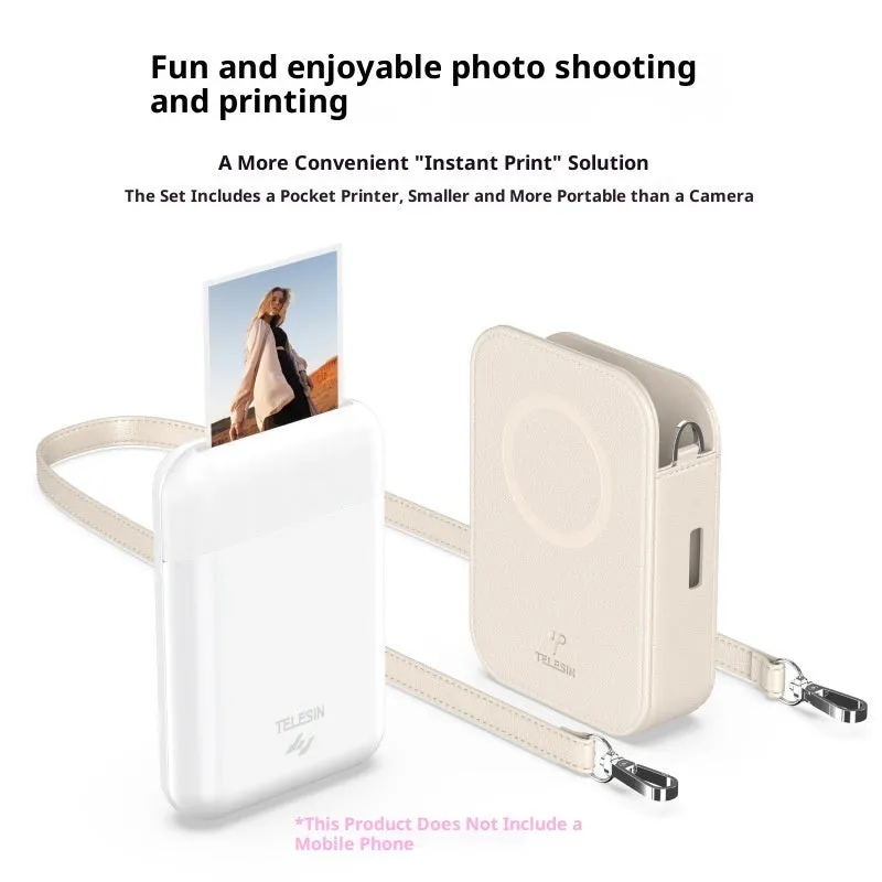 Pocket photo printer in plastic casing with carry-on bag and photo paper on table