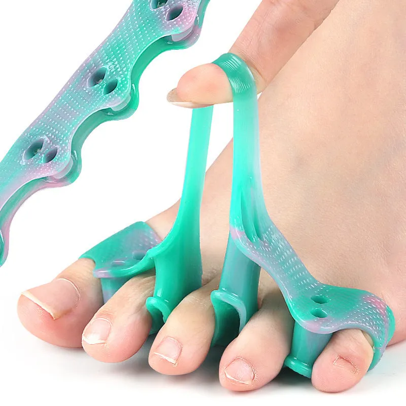 Five-hole toe separator in gradient colour made from soft SEBS material for valgus correction