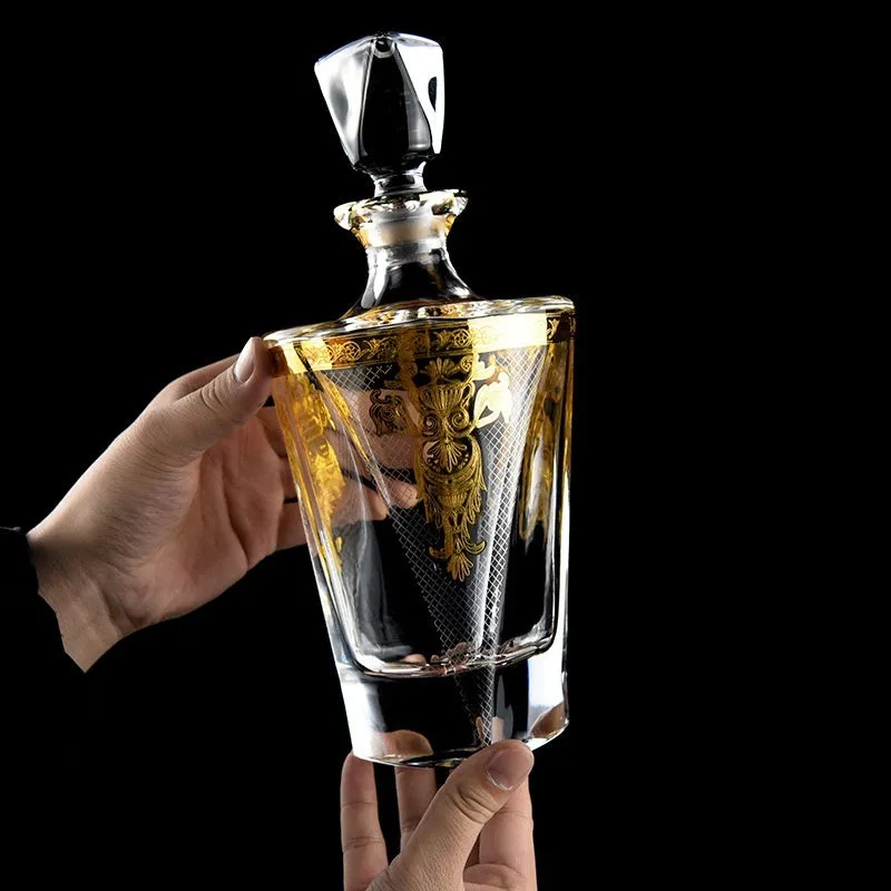 Gold line crystal glass whisky tumbler set with wine bottle and six glasses on a table