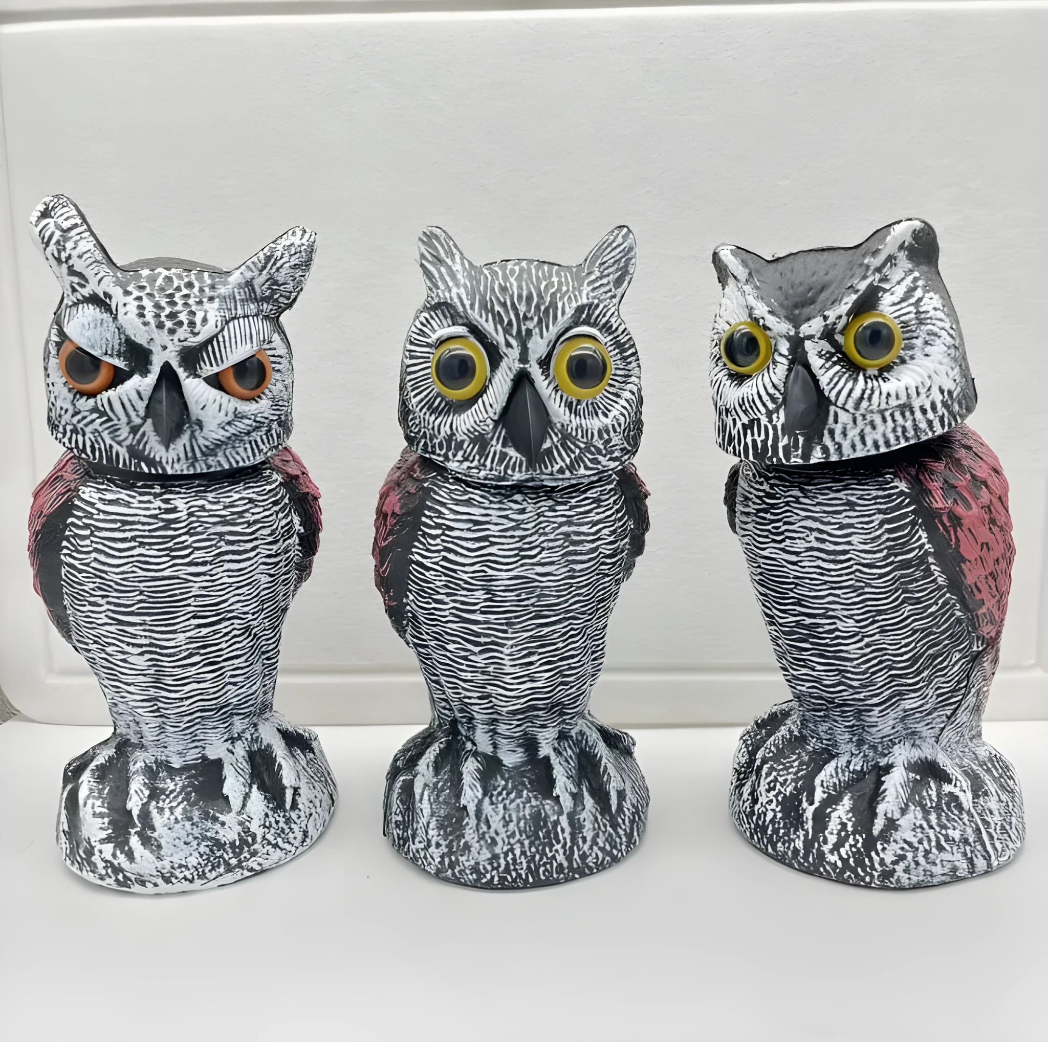 Artificial owl bait ornament with shaking head mechanism for outdoor bird deterrent