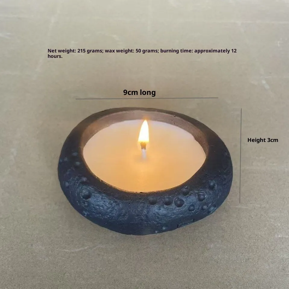 White cement fair-faced candlestick ornament for aromatherapy candles on a shelf