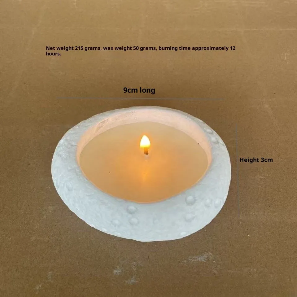 White cement fair-faced candlestick ornament for aromatherapy candles on a shelf