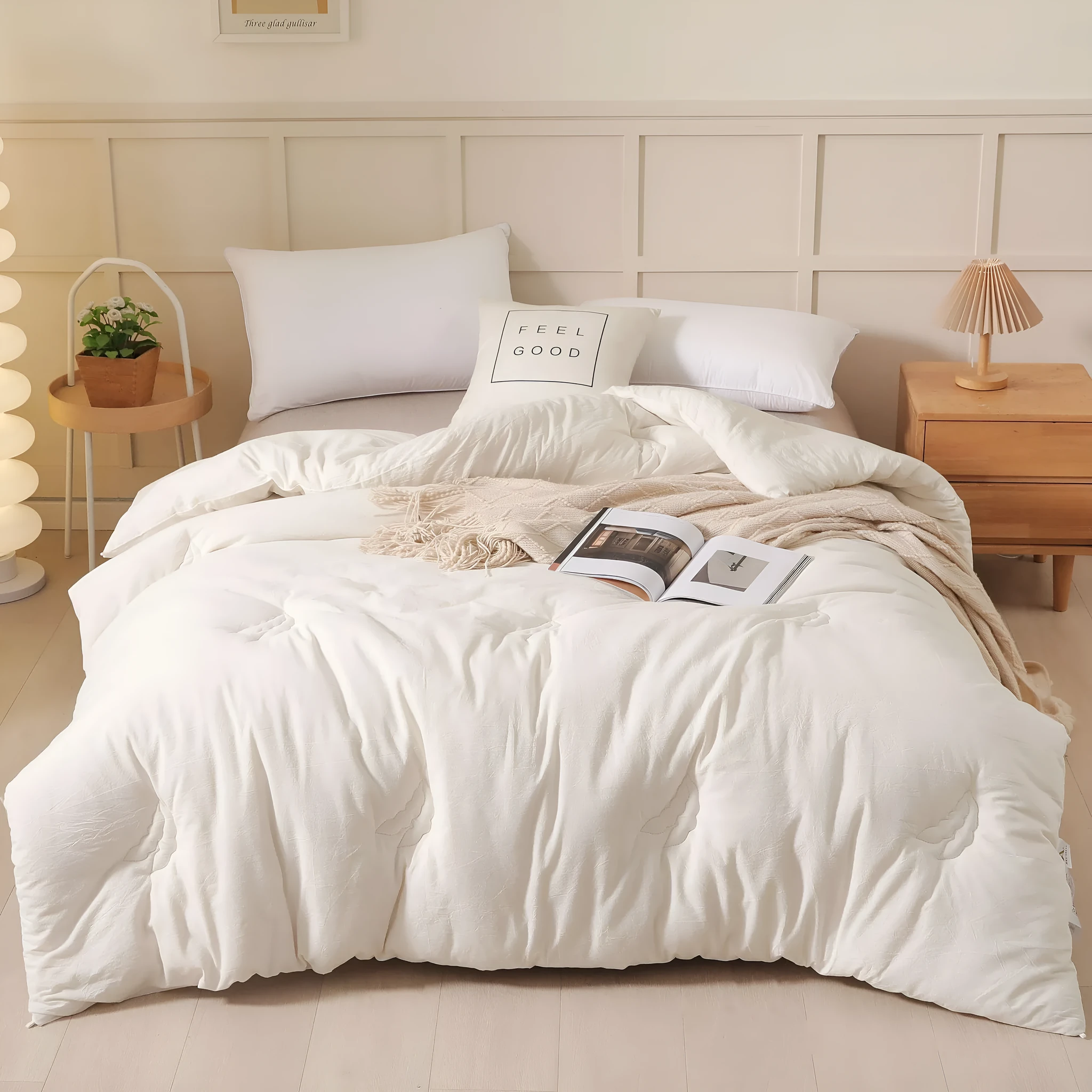 A pure cotton soybean fibre quilt in grey, shown folded, with details of its twill weave and size label.