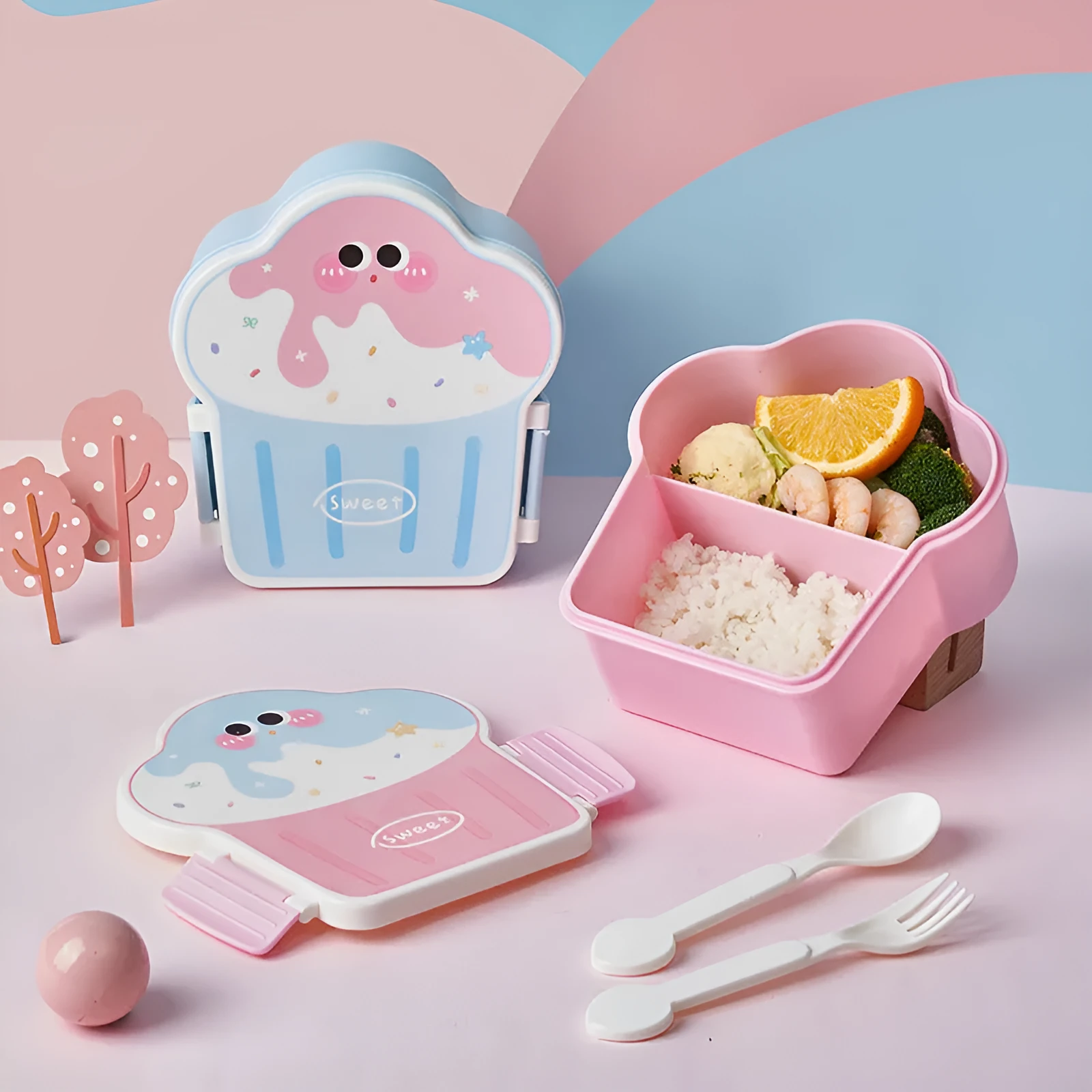Pink and blue ice cream shaped plastic lunch box with compartments and included utensils
