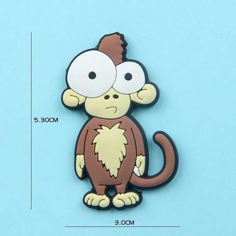 Set of 9 colourful PVC cartoon animal refrigerator stickers on a white fridge surface