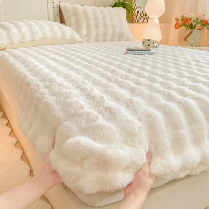 Class A milk fiber fitted sheet with rabbit plush in clear blue, showing elastic edges and smooth surface
