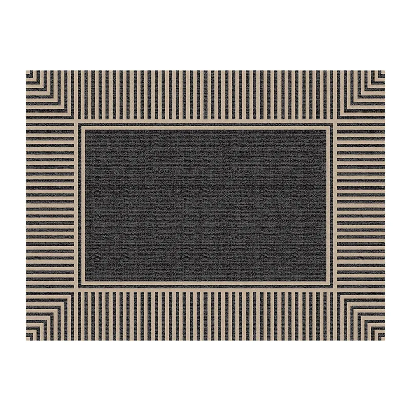 Polyester non-slip entrance door mat with geometric pattern in grey, placed on a tiled floor