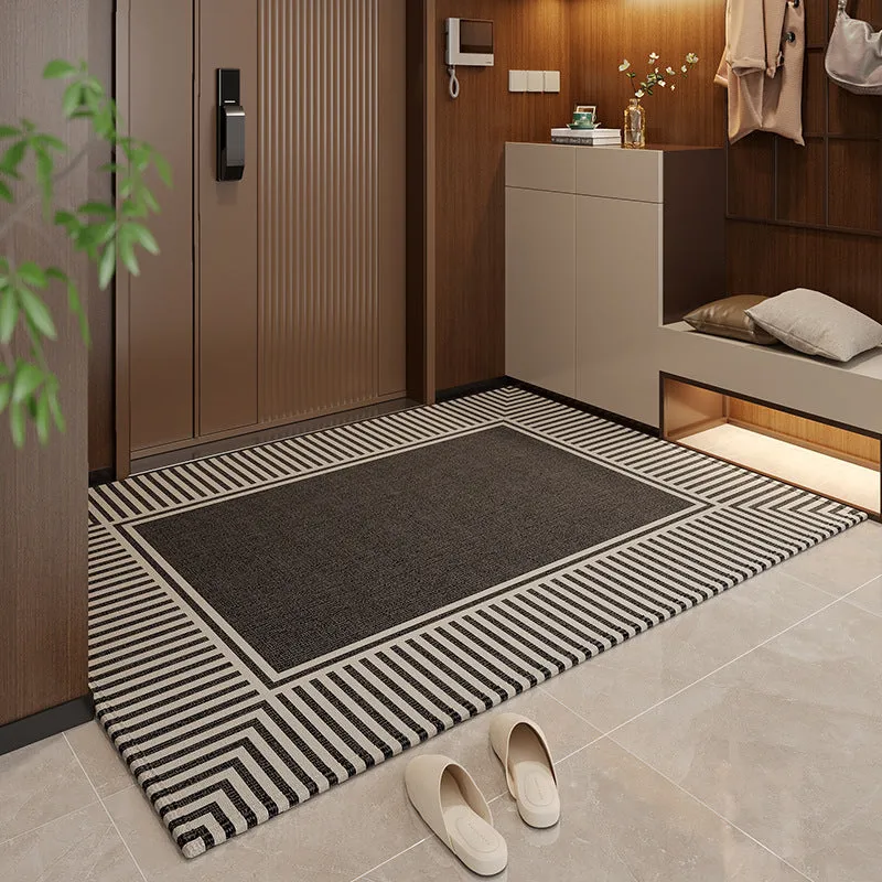 Polyester non-slip entrance door mat with geometric pattern in grey, placed on a tiled floor