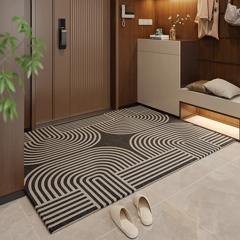 Polyester non-slip entrance door mat with geometric pattern in grey, placed on a tiled floor