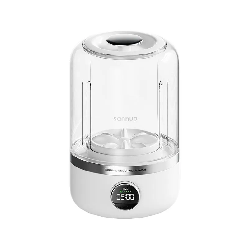 White portable laundry cup rechargeable small washing machine with charging cable on a table