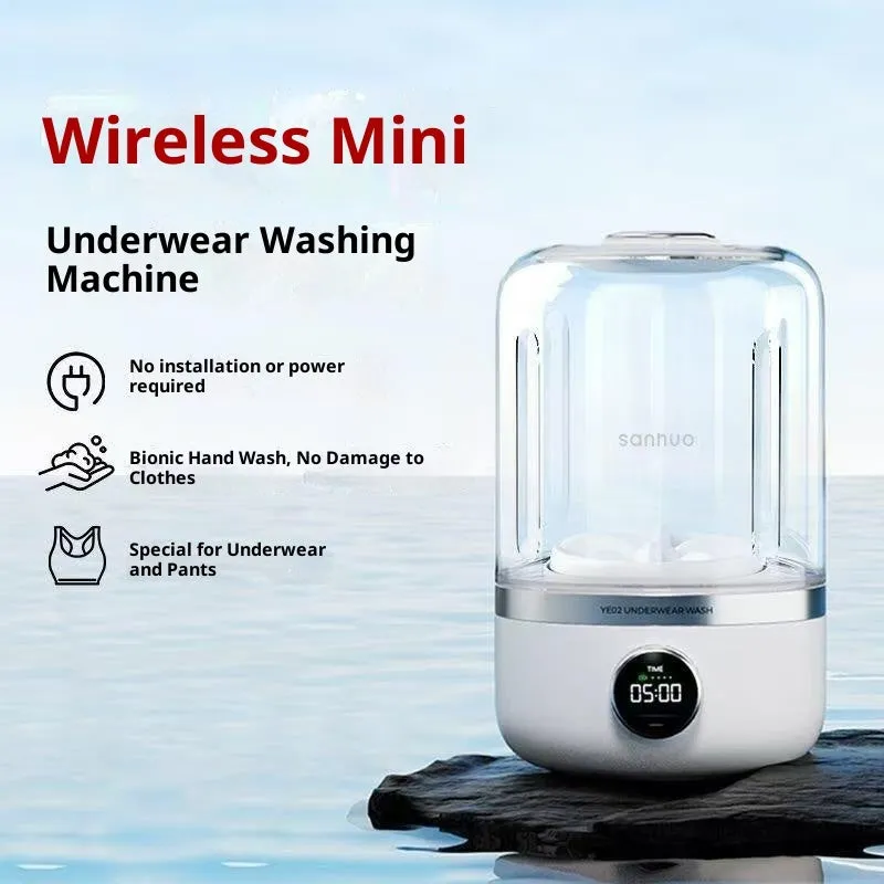 White portable laundry cup rechargeable small washing machine with charging cable on a table