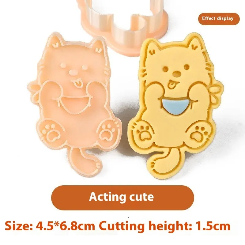 Plastic cartoon biscuit mould showing three-dimensional pet puppy designs including one with a birthday hat