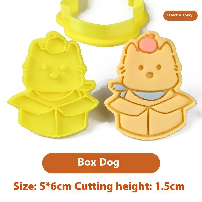 Plastic cartoon biscuit mould showing three-dimensional pet puppy designs including one with a birthday hat