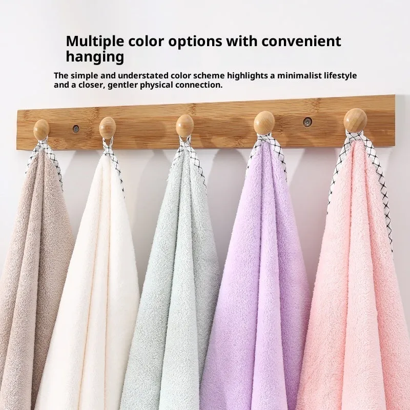 High density coral fleece three-piece towel set in solid vanilla colour with one bath towel and two hand towels