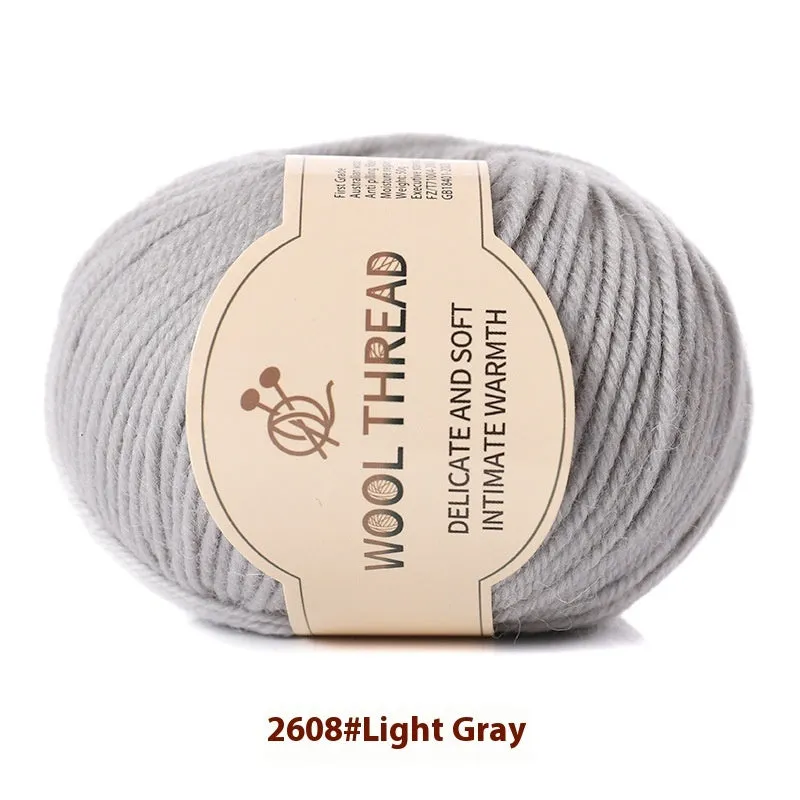 One skein of fine hand knitting wool thread in a choice of colours, shown next to UK size 10 knitting needles.