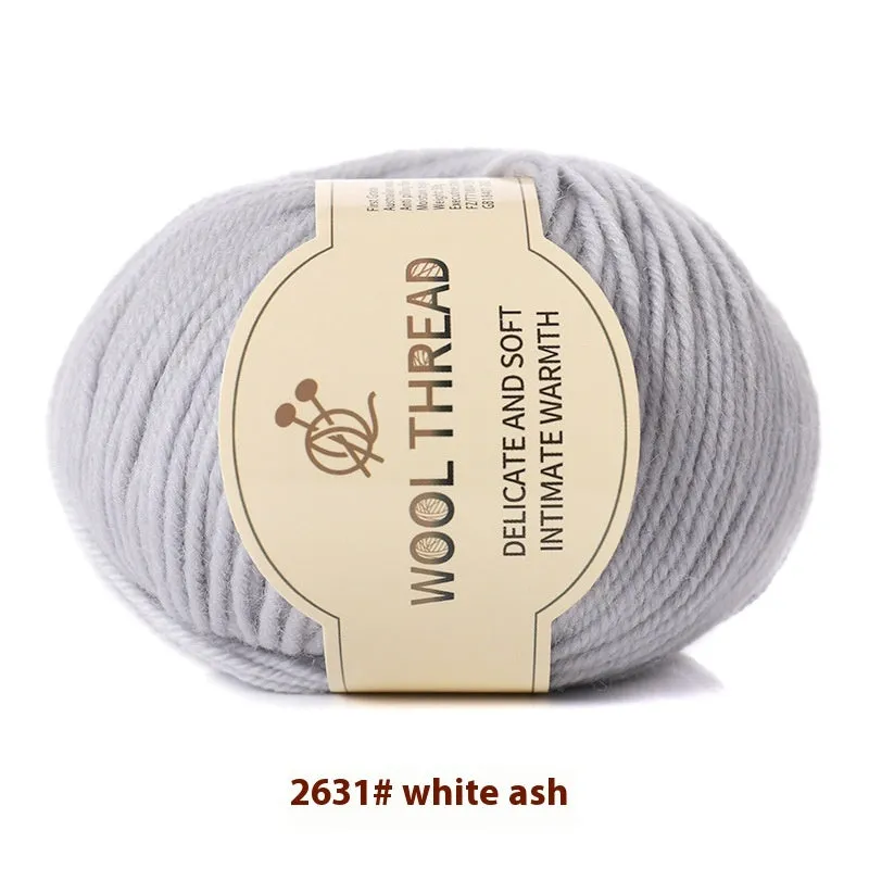 One skein of fine hand knitting wool thread in a choice of colours, shown next to UK size 10 knitting needles.