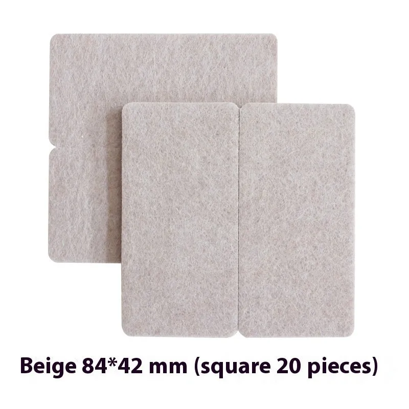 Beige plastic furniture protection foot pads in five different sizes on a wooden floor.