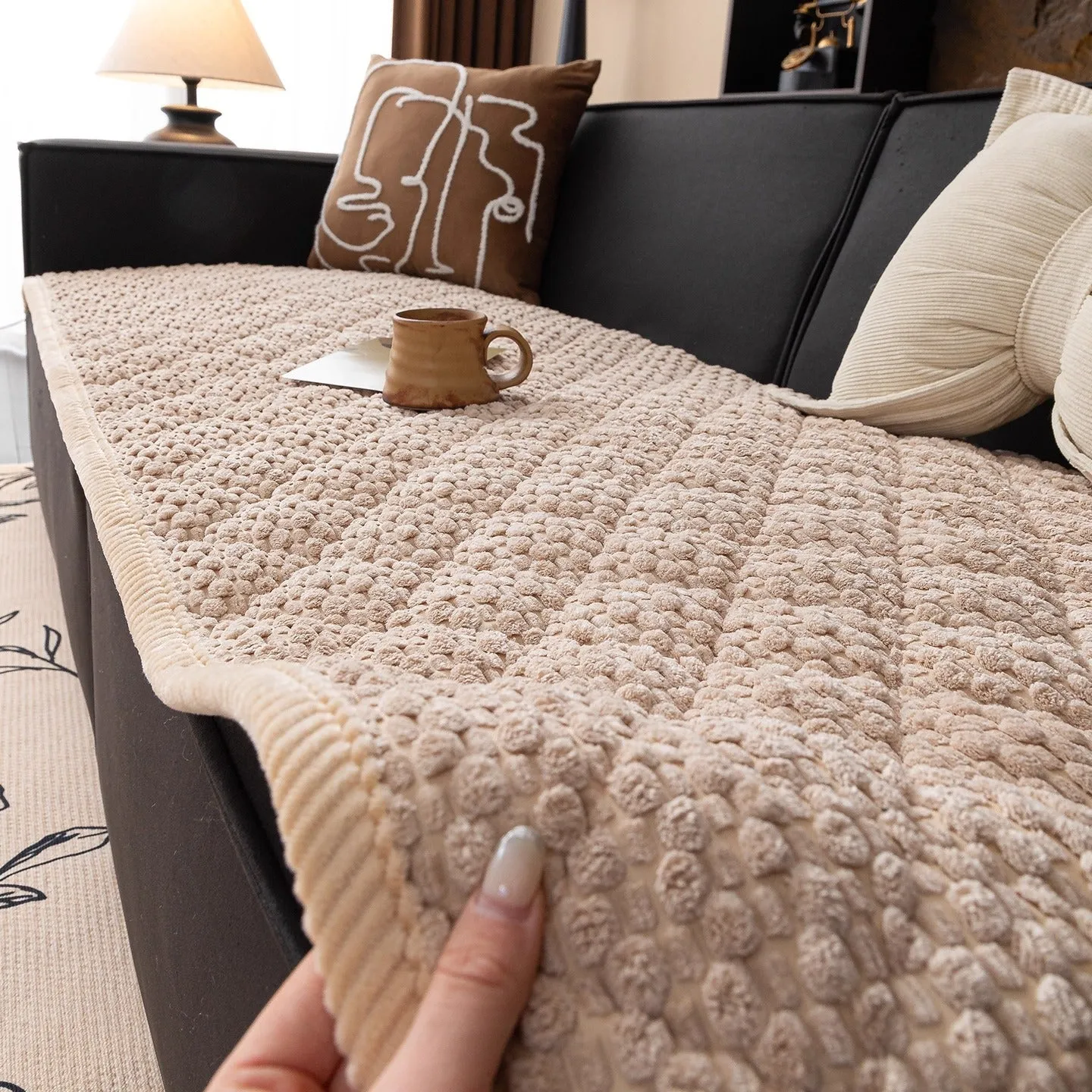 New corduroy sofa cushion in solid puff-beige colour showing textured corduroy fabric