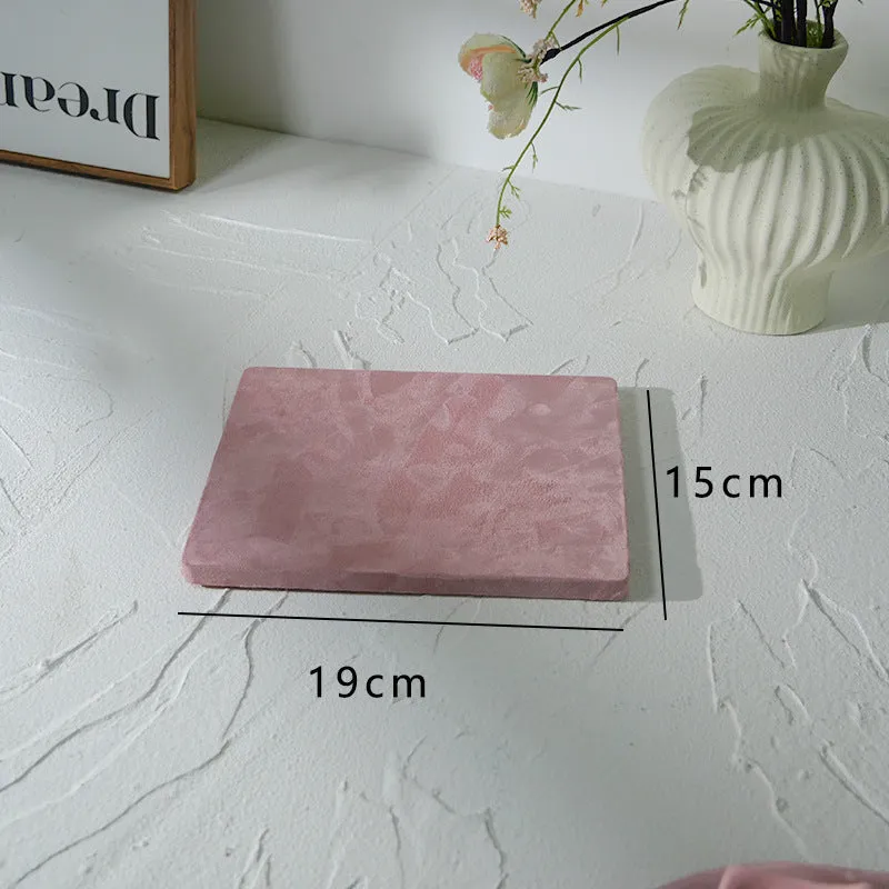 Flannel jewellery display stand in light blue with gypsum base showing 15cm round plate
