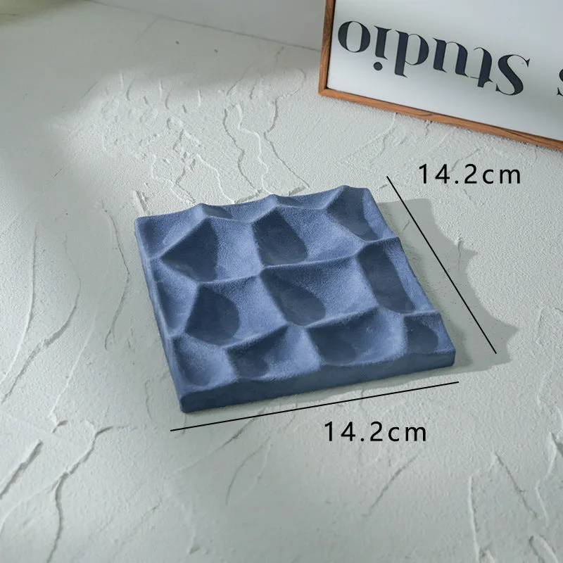 Flannel jewellery display stand in light blue with gypsum base showing 15cm round plate