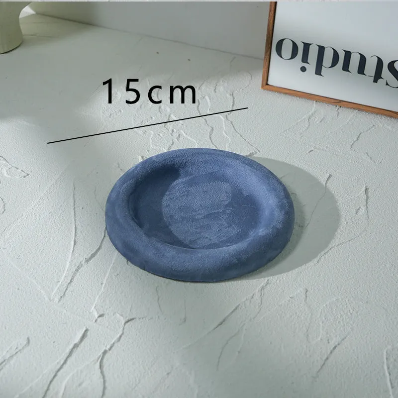 Flannel jewellery display stand in light blue with gypsum base showing 15cm round plate