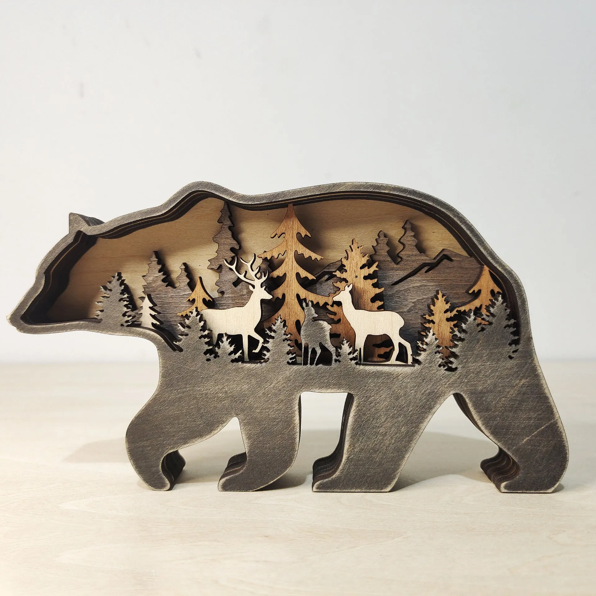 Boxwood elk ornament 18cm tall with antlers, natural wood finish, on a tabletop
