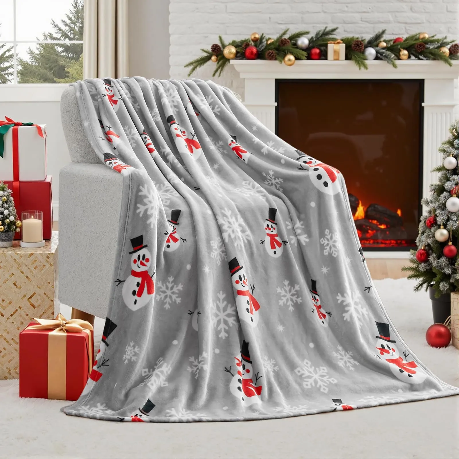Soft red plush Christmas blanket draped over a sofa, showing its textured flannel fabric.