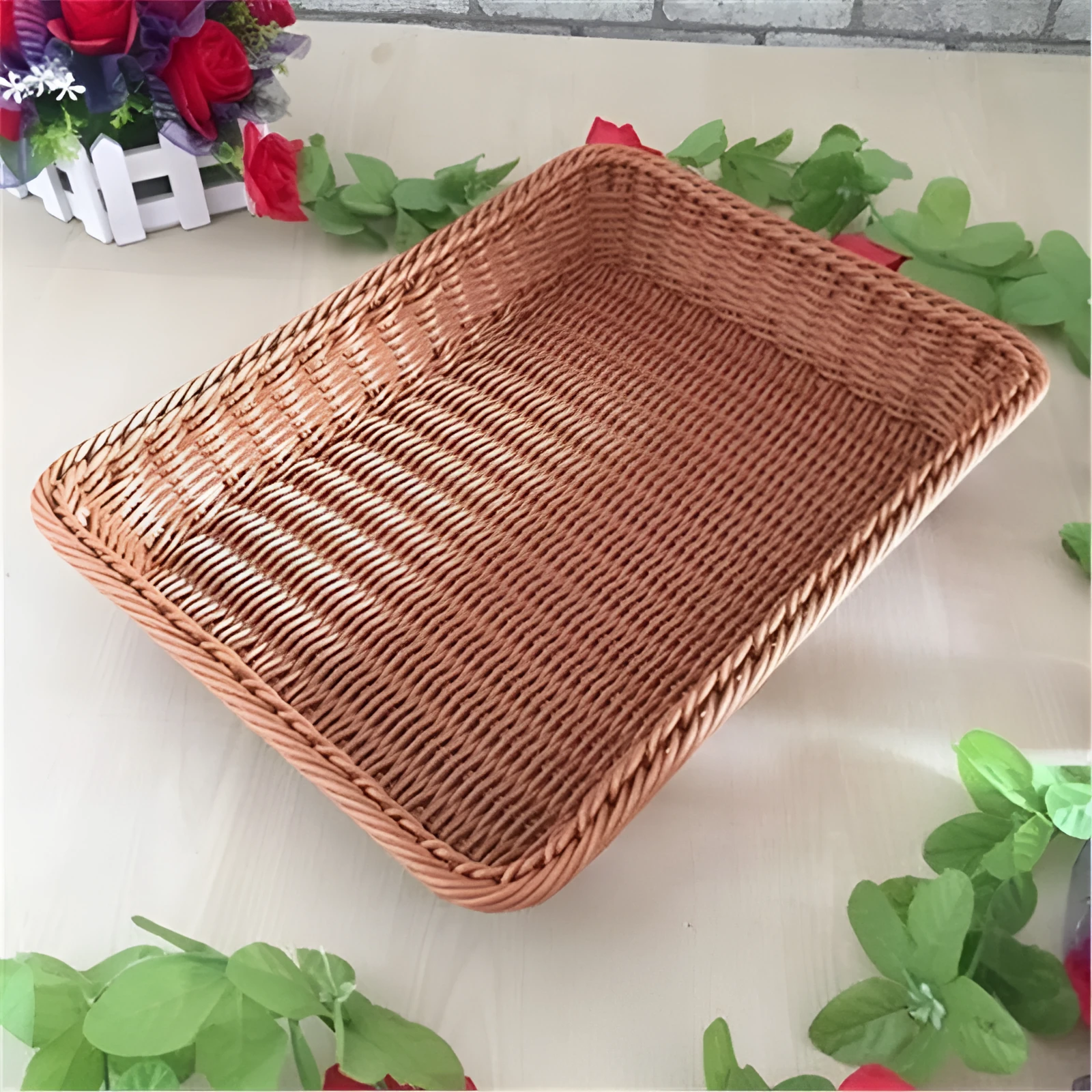 Rattan-like PP fruit and vegetable display storage box in brown, 35x25x7cm, on a kitchen countertop